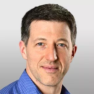 Joshua B. headshot image over a grey background