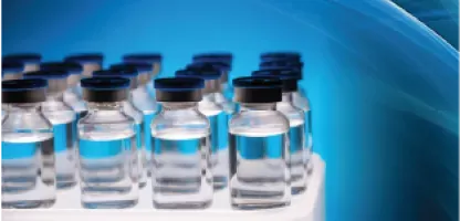 Vials of medicine in 3 rows with blue label and background