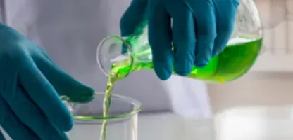 Scientific Decision Support for Advanced Materials Research - gloved hand pouring beaker thumbnail