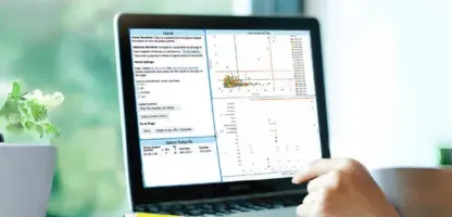 Clinical Data Review: Discovery Solution image with monitor view, and turquoise background